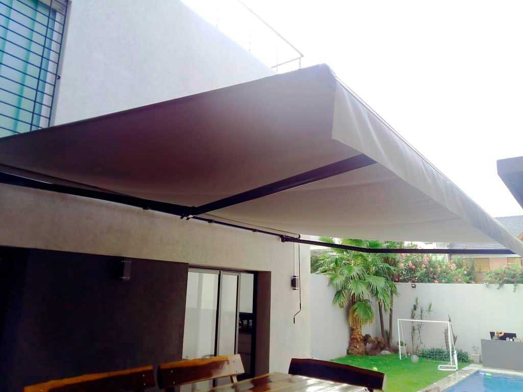 toldo-brazos-invisibles-italiano-devoto-04 toldo brazos invisibles motor somfy a tecla